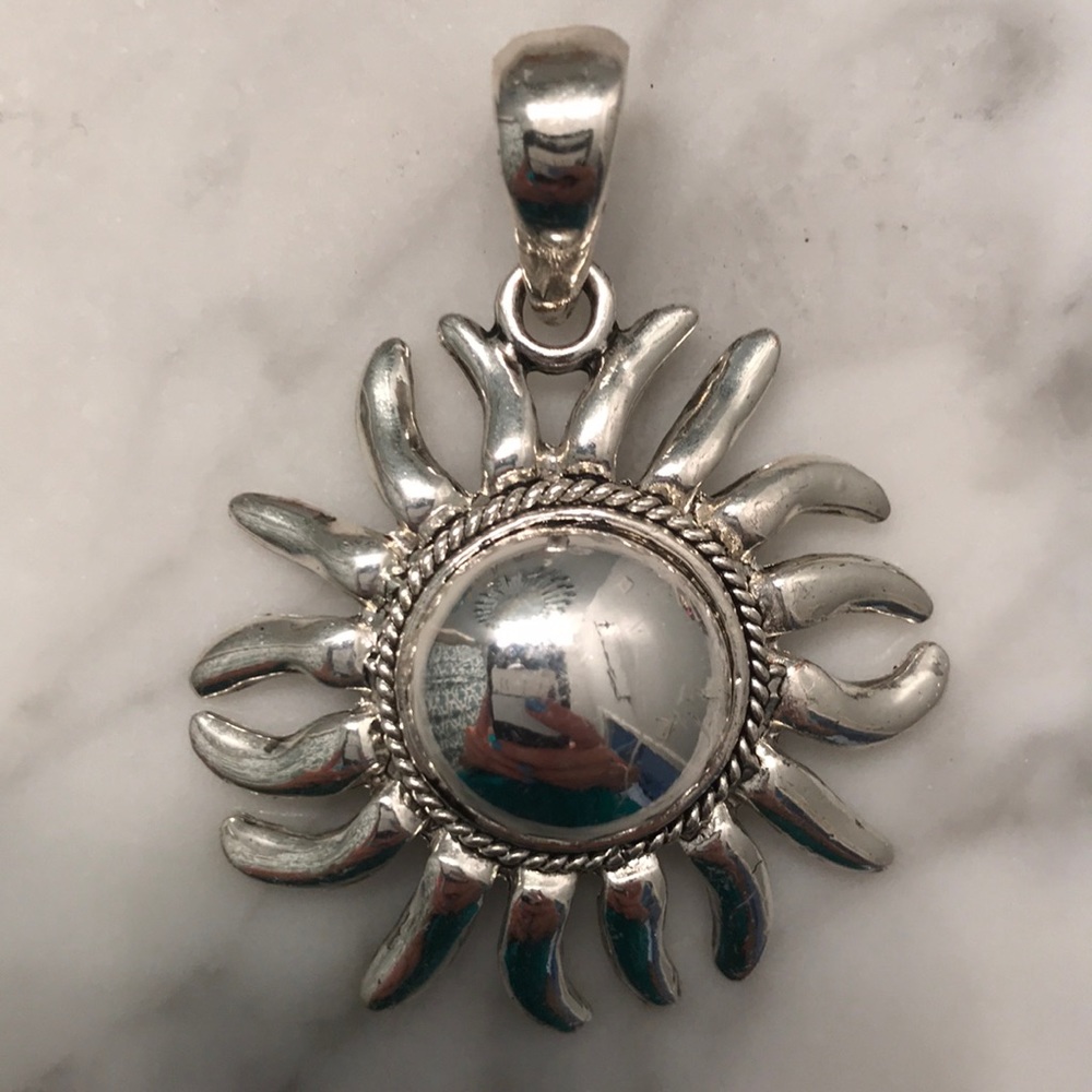 Sterling silver sun pendant
